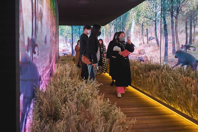 Visitors walk through the "Gucci Garden Archetypes" exhibition, which took place at the Dongdaemun Design Plaza in March 2022. (Seoul Design Foundation)