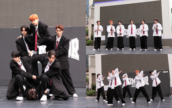 82Major holds a busking performance at the Gangnam Square on Sunday to promote the band's first EP ″Beat by 82." [GREAT M ENTERTAINMENT]