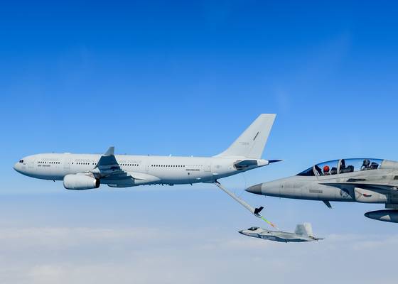 A KF-21 fighter jet, center, flies while connected to a KC-330 tanker aircraft during an aerial refueling test off the southeastern coast of Korea in March. [DEFENSE ACQUISITION PROGRAM ADMINISTRATION]