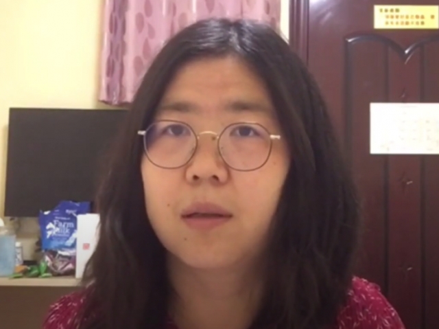 중국 시민기자 장잔이 체포되기 전 모습. 유튜브 캡처