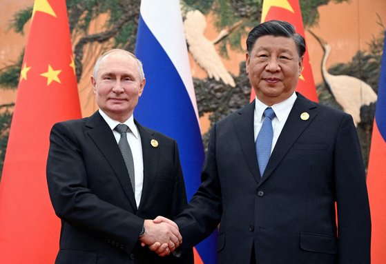 블라디미르 푸틴 러시아 대통령(왼쪽)과 시진핑 중국 국가주석. 로이터=연합뉴스
