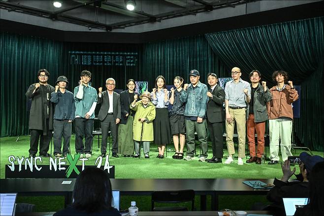 Artists participating in Sync Next 24 by the Sejong Center for the Performing Arts pose for photos at the Sejong pop-up st in Seongsu-dong, eastern Seoul on Thursday. (Sejong Center)