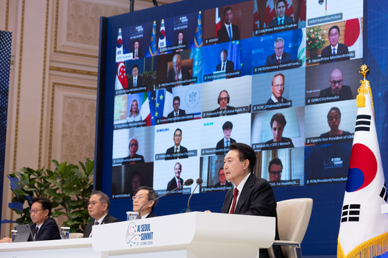 President Yoon Suk Yeol speaks in a virtual leaders’ session of the AI Seoul Summit at the Blue House in central Seoul Tuesday. [PRESIDENTIAL OFFICE]