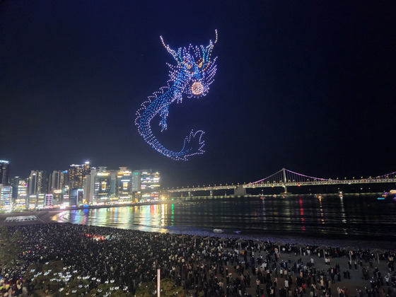 Drones form the shape of the Blue Dragon during the M Drone Light Show at Gwangalli Beach, Busan, on Jan. 1, 2024. [JOONGANG ILBO]