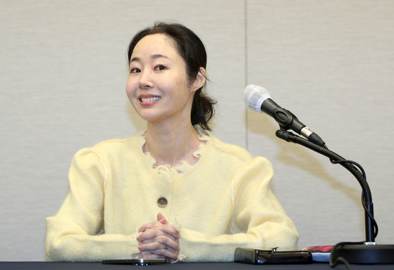 ADOR CEO Min Hee-jin smiles during Friday's press conference [NEWS1]