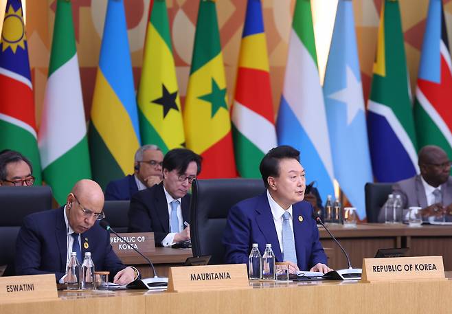 South Korean President Yoon Suk Yeol (right in first row) delivers an opening address during the Korea-Africa summit held at KINTEX in Ilsan, north of Seoul, on Tuesday. (Yonhap)