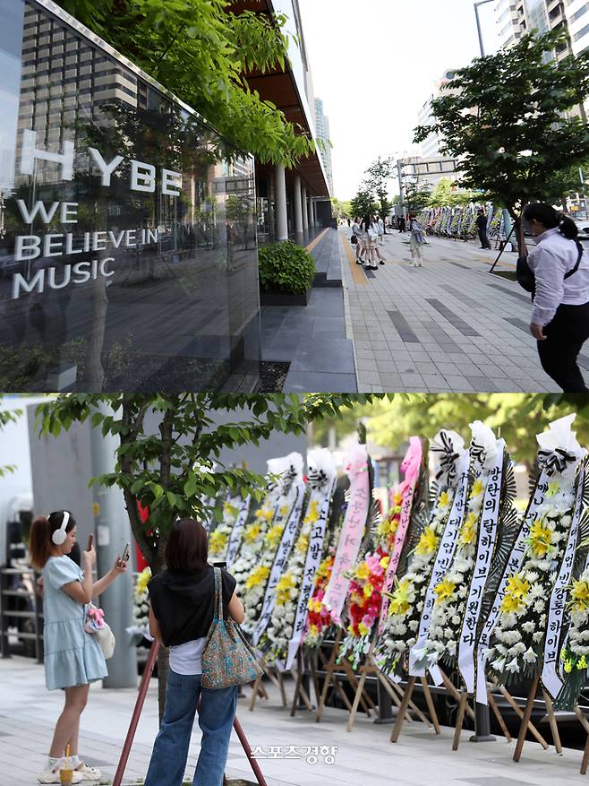 지난달 3일 서울 용산구 하이브 사옥 앞에 방탄소년단의 팬 아미(ARMY)가 보낸 항의성 문구가 담긴 근조화환이 놓여 있다. 정지윤 선임기자