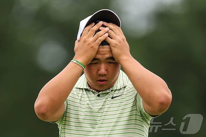 로켓 모기지 투어에서 컷 탈락한 김주형. ⓒ AFP=뉴스1