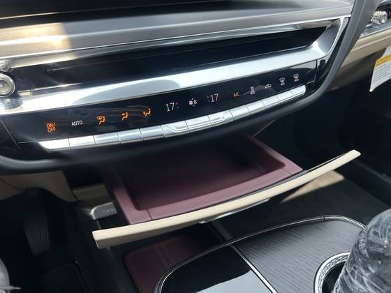 Lyriq offers a storage space under the center fascia. [SARAH CHEA]