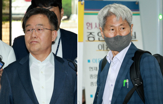 대장동 사건과 관련해 ‘허위 인터뷰 의혹’을 받는 화천대유자산관리 대주주 김만배(왼쪽) 씨와 전 언론노조위원장 신학림 씨가 지난 6월 20일 오전 서울 서초구 서울중앙지법에서 열린 구속전 피의자 심문(영장실질심사)을 받기 위해 법정으로 들어가고 있다. 뉴시스