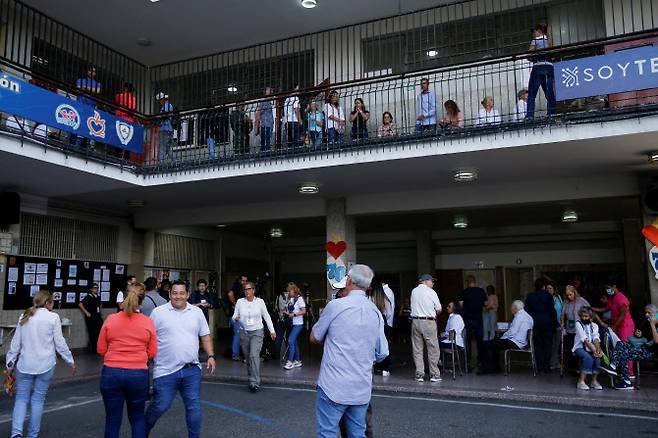 People wait to vote in the country‘s presidential election, in Caracas, Venezuela July 28, 2024. REUTERS/Leonardo Fernandez Viloria