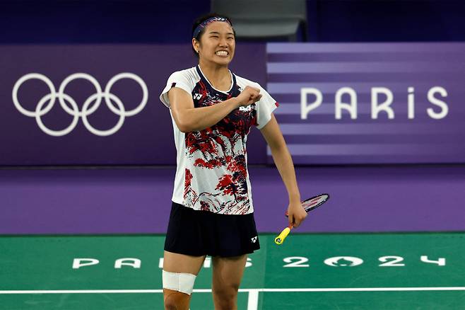 3일 올림픽 8강전에서 승리 후 세리머니하는 안세영. AFP=연합뉴스