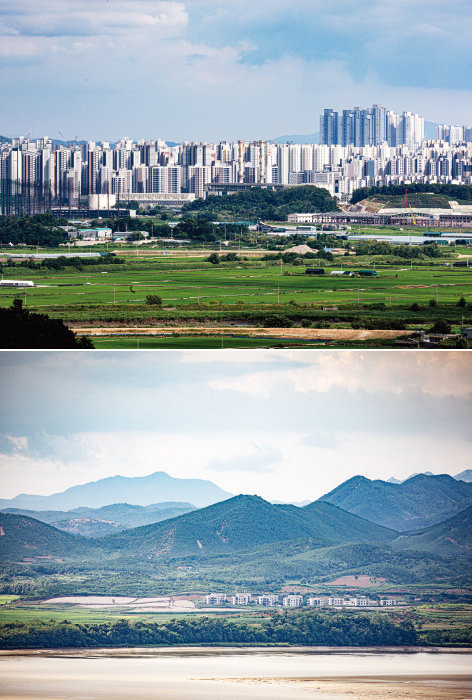 오두산통일전망대에서 남동쪽으로 바라본 파주 운정신도시와 임진강 건너 북동쪽 북한 마을이 남북한의 극명한 발전상을 보여준다.