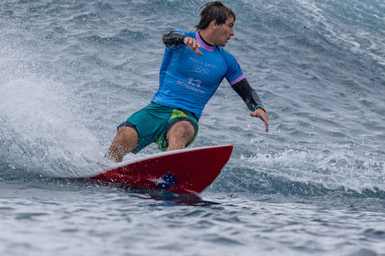 Jack Robinson of Australia rides a wave  [REUTERS/YONHAP]