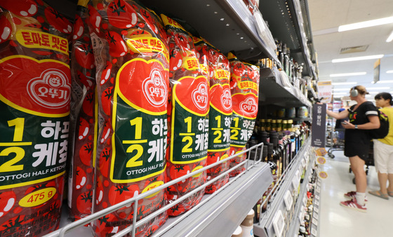 Ottogi's ketchup products are displayed at a discount mart in Seoul on Friday.[NEWS1]