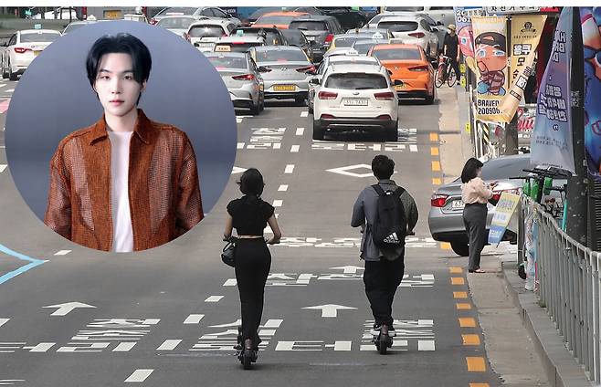 On the left, photo of Suga, and left, people ride electronic scooters on the prohibited middle of the road. [JOONGANG ILBO]