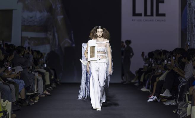 Models wear creations for LIE as part of the spring-summer 2025 Seoul Fashion Week at Dongdaemun Design Plaza in Seoul on Saturday. (Seoul City)