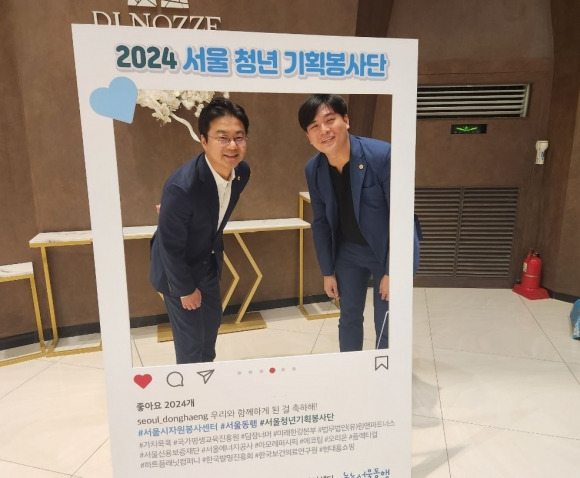 지난 12일 ‘2024 서울동행 기획봉사 성과 공유회’에 참석한 장태용 위원장(왼쪽)