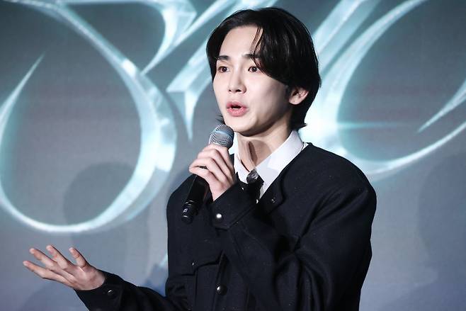 Key introduces his 3rd EP to local reporters at a press conference in Seoul on Monday. (Yonhap)