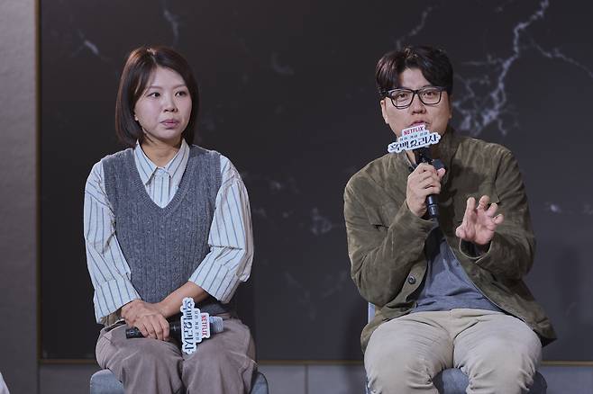 Producers Kim Eun-ji, left, and Kim Hak-min speak to the press during the show's press conference at Hotel Naru Seoul MGallery Ambassador in Mapo District, western Seoul, on Monday. [NETFLIX KOREA]