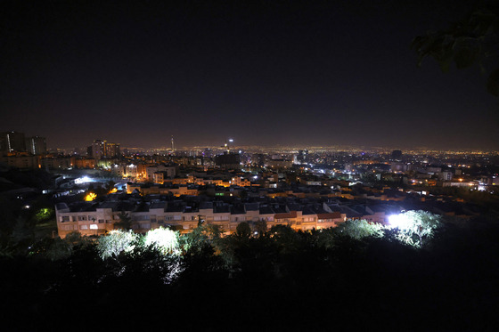 A view of Tehran after several explosions were heard in Iran on Saturday. Israel announced the launch of ″precise strikes″ on military targets in Iran on Saturday, in retaliation for earlier missile attacks against it. [AFP/YONHAP]