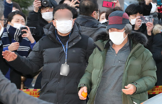 Cho Doo-soon after serving 12 years in prison is released from the jail and walks to the Ansan Probation Office in Ansan, Gyeonggi on Dec. 12 in 2020. [NEWS1]