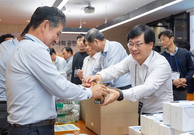 HDC Hyundai Development Company officials join a social responsibility event in July. (HDC Hyundai Development Company)