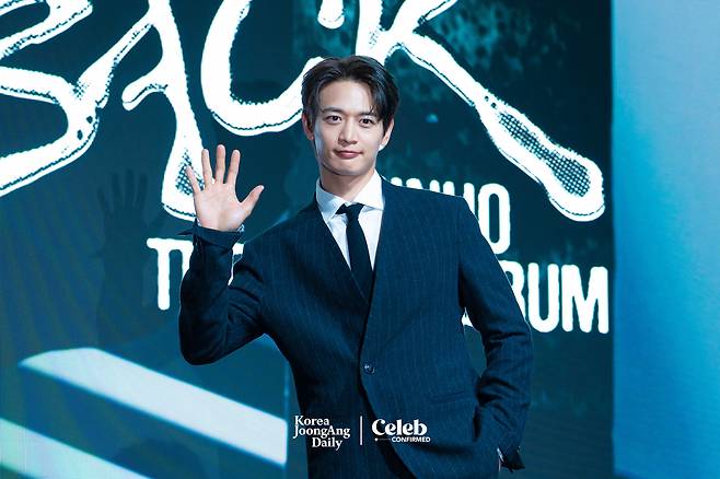 Minho poses for the cameras during a press conference held on Monday at the Fairmont Ambassador Seoul in Yeouido, western Seoul. [DANIELA GONZALEZ PEREZ]