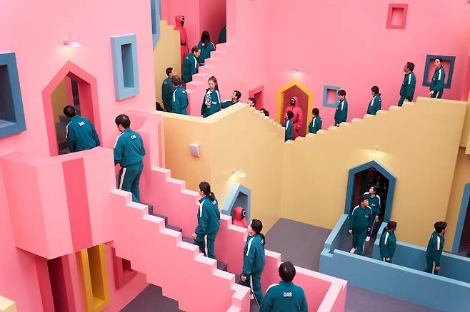 Participants navigate maze corridors in "Squid Game 2." (Netflix)