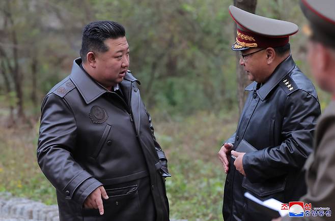 North Korean leader Kim Jong-un (left) inspects strategic missile bases, in this undated photo provided by North Korea's official Korean Central News Agency on Oct. 23, 2024. (Yonhap)