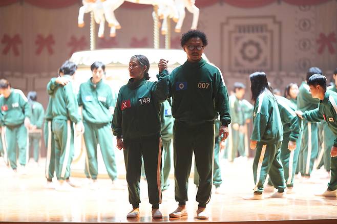 Kang Ae-sim (left) and Yang Dong-geun star as mother-son duo in "Squid Game 2." (Netflix)