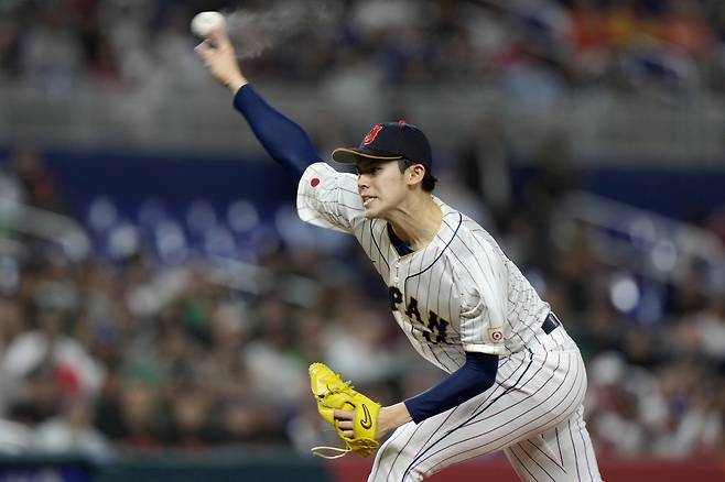 FILE- Japan's Roki Sasaki delivers a pitch during the first inning of a World Baseball Classic game against Mexico, Monday, March 20, 2023, in Miami. (AP Photo/Wilfredo Lee, File) FILE PHOTO
<저작권자(c) 연합뉴스, 무단 전재-재배포, AI 학습 및 활용 금지>