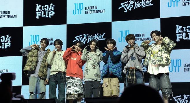 From left: KickFlip members Juwang, Donghwa, Amaru, Kyehoon, Keiju, Donghyeon and Minje pose for a picture during a press conference held at Yes 24 Live Hall, Gwangjin-gu, Seoul, Monday. (Park Ji-eun/The Korea Herald)