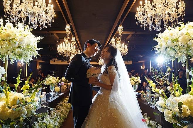 Kim Ye-byeol and her husband at their wedding on Oct. 28, 2023 (Courtesy of Kim)