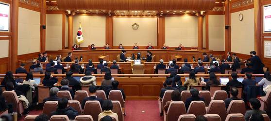 문형배 헌법재판소장 권한대행을 비롯한 재판관들이 18일 서울 종로구 헌법재판소에서 열린 윤석열 대통령 탄핵심판 9차 변론기일에 참석해 있다. 뉴스1