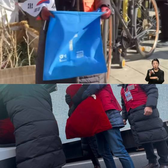 광화문 탄핵 반대 집회장에서 거둔 헌금 돈 자루가 여러대의 차량 트렁크에 나뉘어 실리고 있는 모습