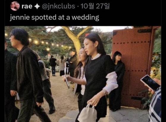 Jennie of K-pop act Blackpink appears at a wedding wearing a black-shaded outfit. [SCREEN CAPTURE]