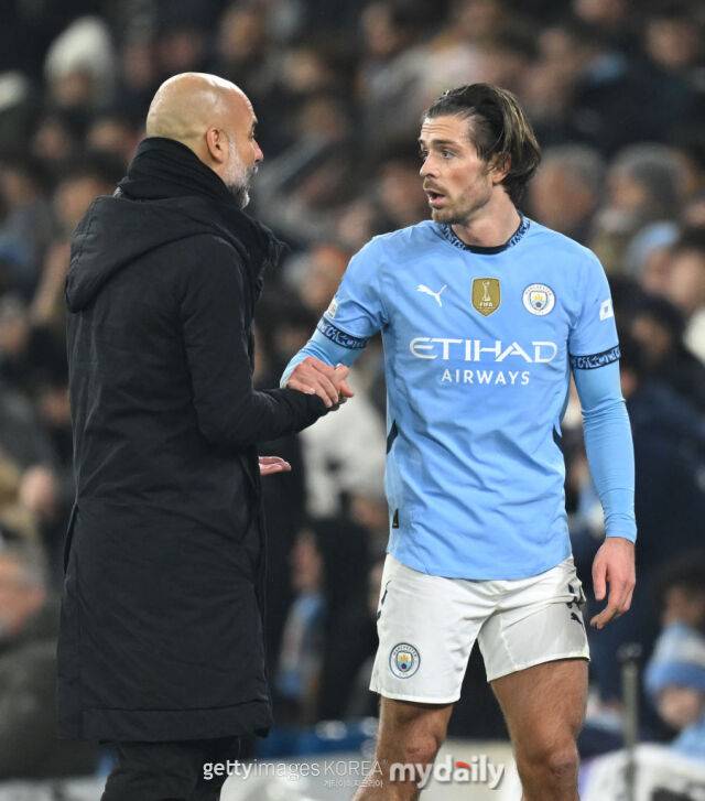 맨체스터 시티 미드필더 잭 그릴리시와 펩 과르디올라 감독./게티이미지코리아