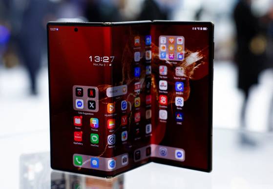 The Huawei Mate XT Ultimate is showcased during the MWC trade show at Fira de Barcelona, Spain, on March 3. [REUTERS/YONHAP]
