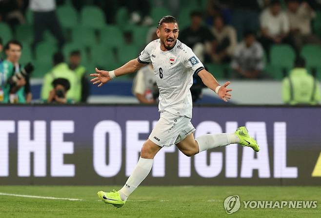 추격골 넣은 이라크의 아캄 하솀 [로이터=연합뉴스]