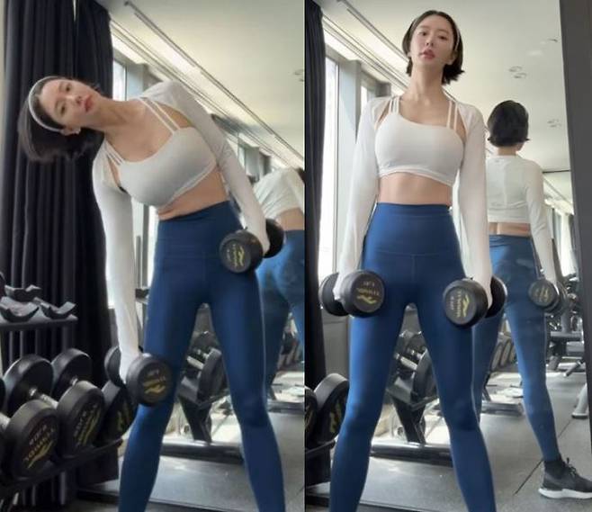 클라라가 덤벨 사이드 밴드 운동을 하고 있다. [사진=클라라 인스타그램 영상 캡처]