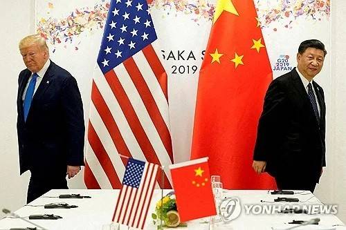 2019년 6월 일본 오사카에서 열린 G20 정상회의를 계기로 만난 트럼프와 시진핑. [로이터 연합뉴스 자료사진. 재판매 및 DB 금지]