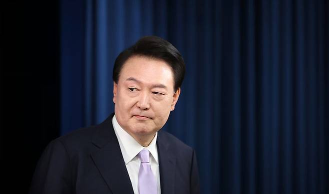 Then-President Yoon Suk-yeol arrives for a news conference at the presidential office in Seoul on Nov. 7, 2024. /AP-Yonhap News