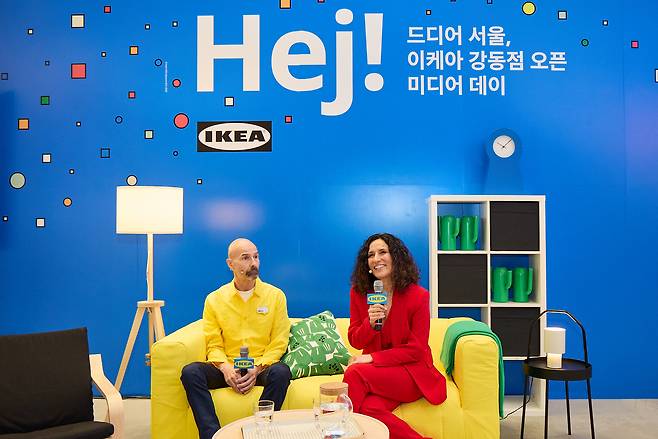 Isabel Puig, CEO and chief sustainability officer of Ikea Korea (right) and Magnus Norberg,  Ikea Gangdong market manager,  speak at a pre-opening press event at the IKEA Gangdong, on Friday. (Ikea Korea)