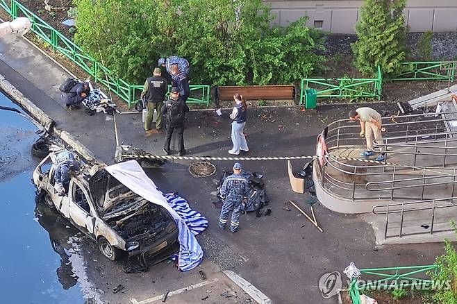 러시아 군장성 사망한 차량 폭발 현장 [타스 연합뉴스. 재판매 및 DB 금지]