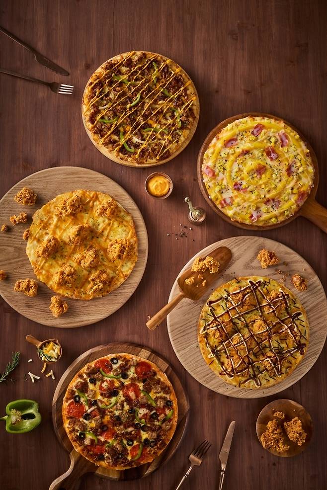 맘스터치는 2023년 ‘맘스피자’를 론칭, 숍인숍 전략으로 빠르게 덩치를 키우는 중이다. (맘스터치 제공)