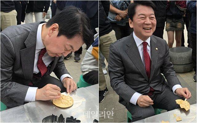 안철수 국민의힘 대선 경선 후보가 27일 오후 부산 수영구 광안리 해수욕장에서 달고나 뽑기를 시도하고 있다. ⓒ데일리안 고수정 기자