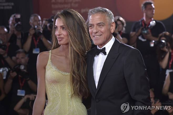 영화배우 조지 클루니(오른쪽)와 부인 아말 클루니 [UPI=연합뉴스 자료사진]