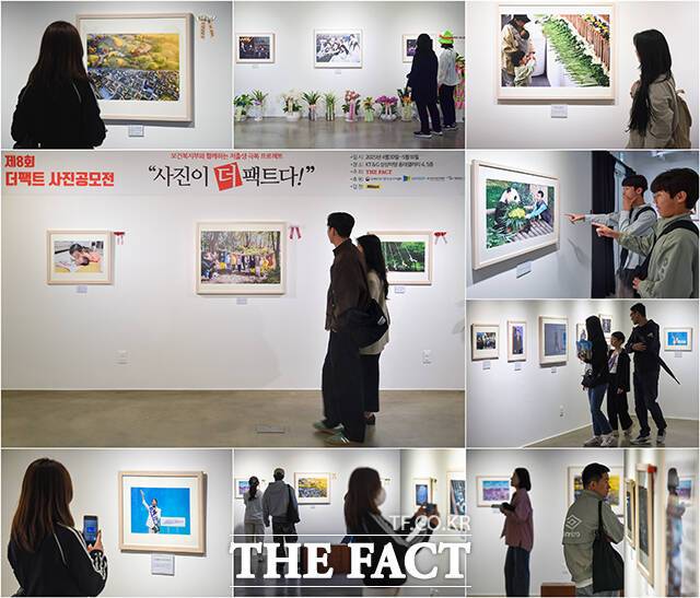 제8회 더팩트 사진 공모전 '사진이 '더' 팩트다!' 사진전이 5일 오후 서울 마포구 KT&G 상상마당 홍대 갤러리에서 전시 중인 가운데 시민들이 공모전 수상작들과 보도사진을 감상하고 있다. /장윤석 기자