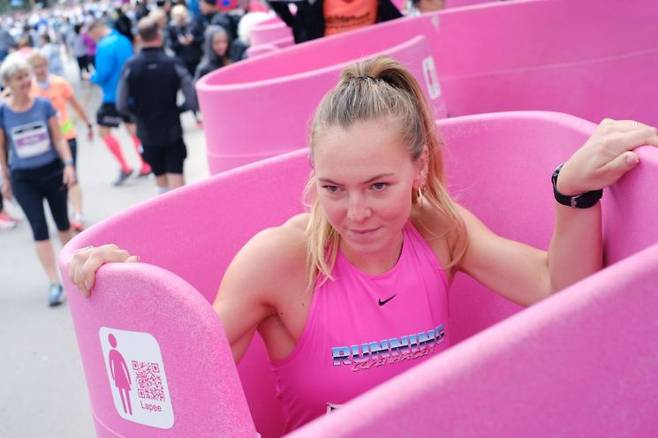 2019년 10월 덴마크 코펜하겐에서 열린 하프 마라톤 대회에서 한 여성이 라피 제품을 사용하고 있다. 라피 홈페이지